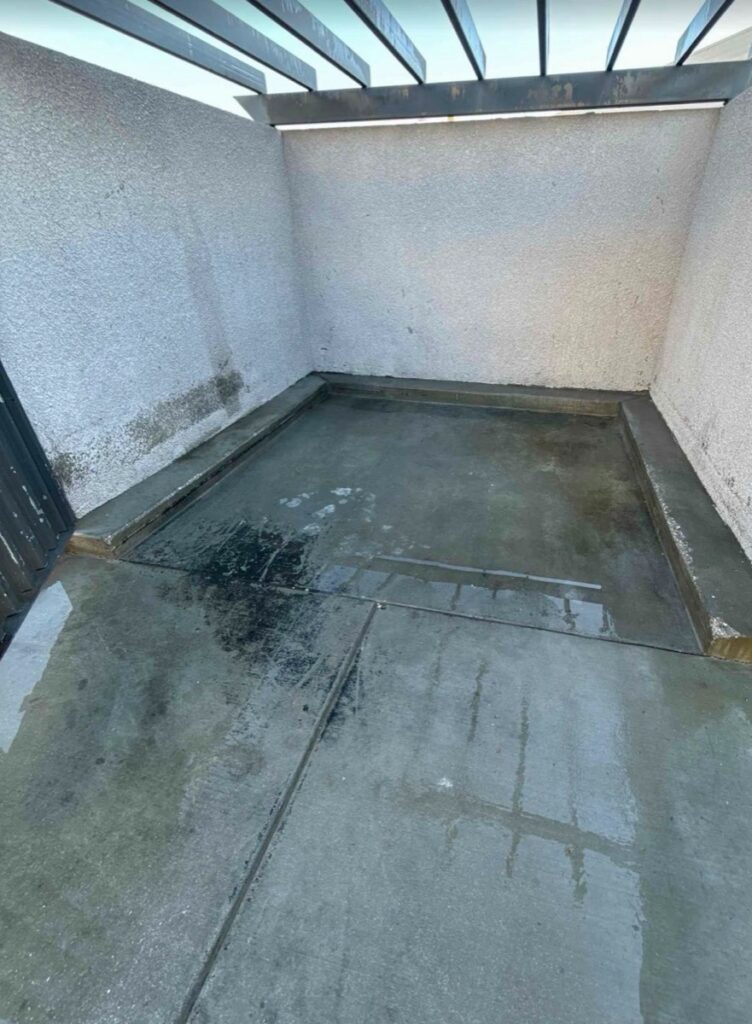 Dumpster enclosure after
